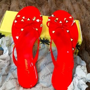 Forever sandals or flip flops new inbox red with golden bellishments size 7